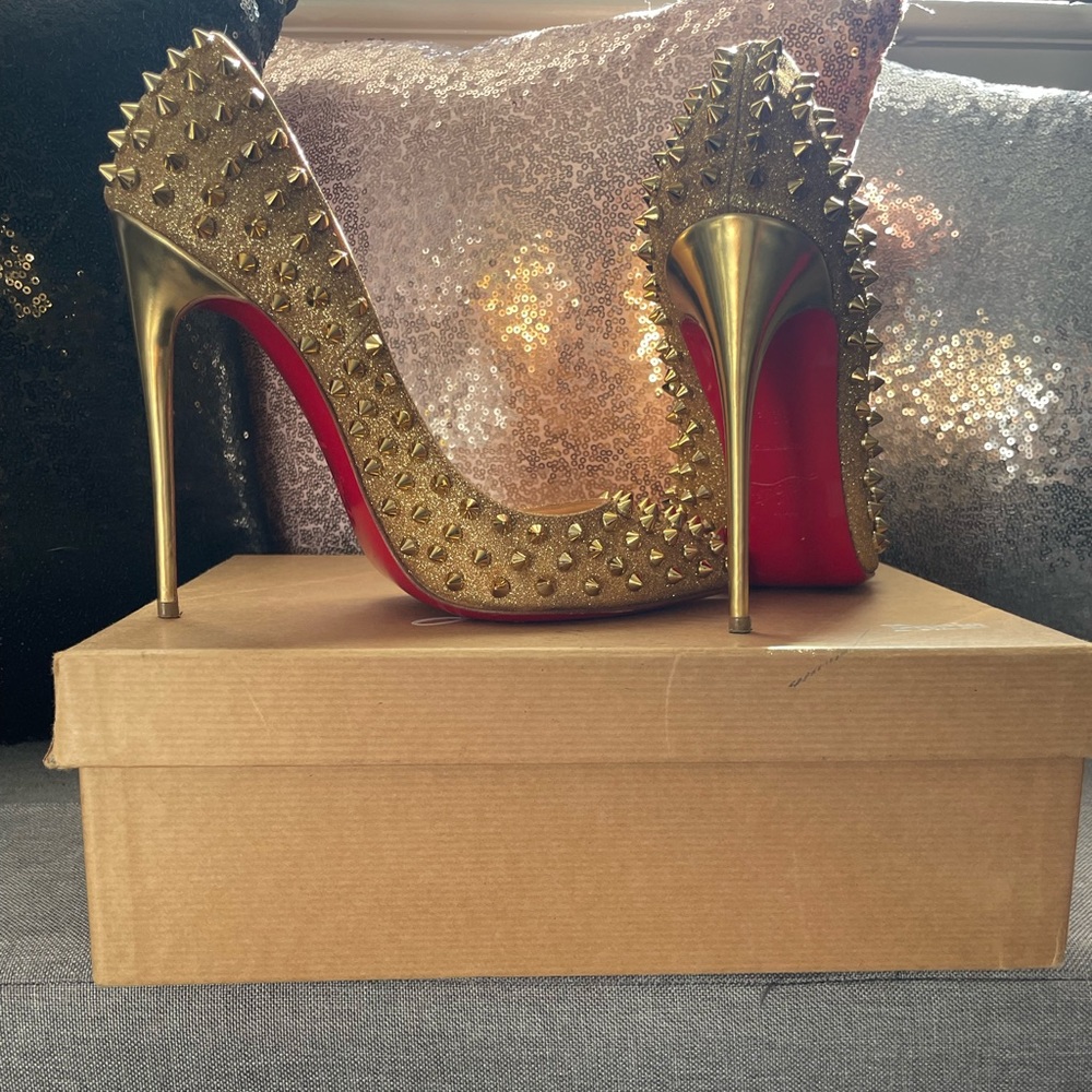Gold Follies Spike Louboutin heels. 6 inch heel.